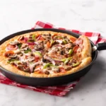 Pizza Hut Bangkitkan Nostalgia 90-an, Sambut Inovasi Menu Crispy Parm Pan Pizza